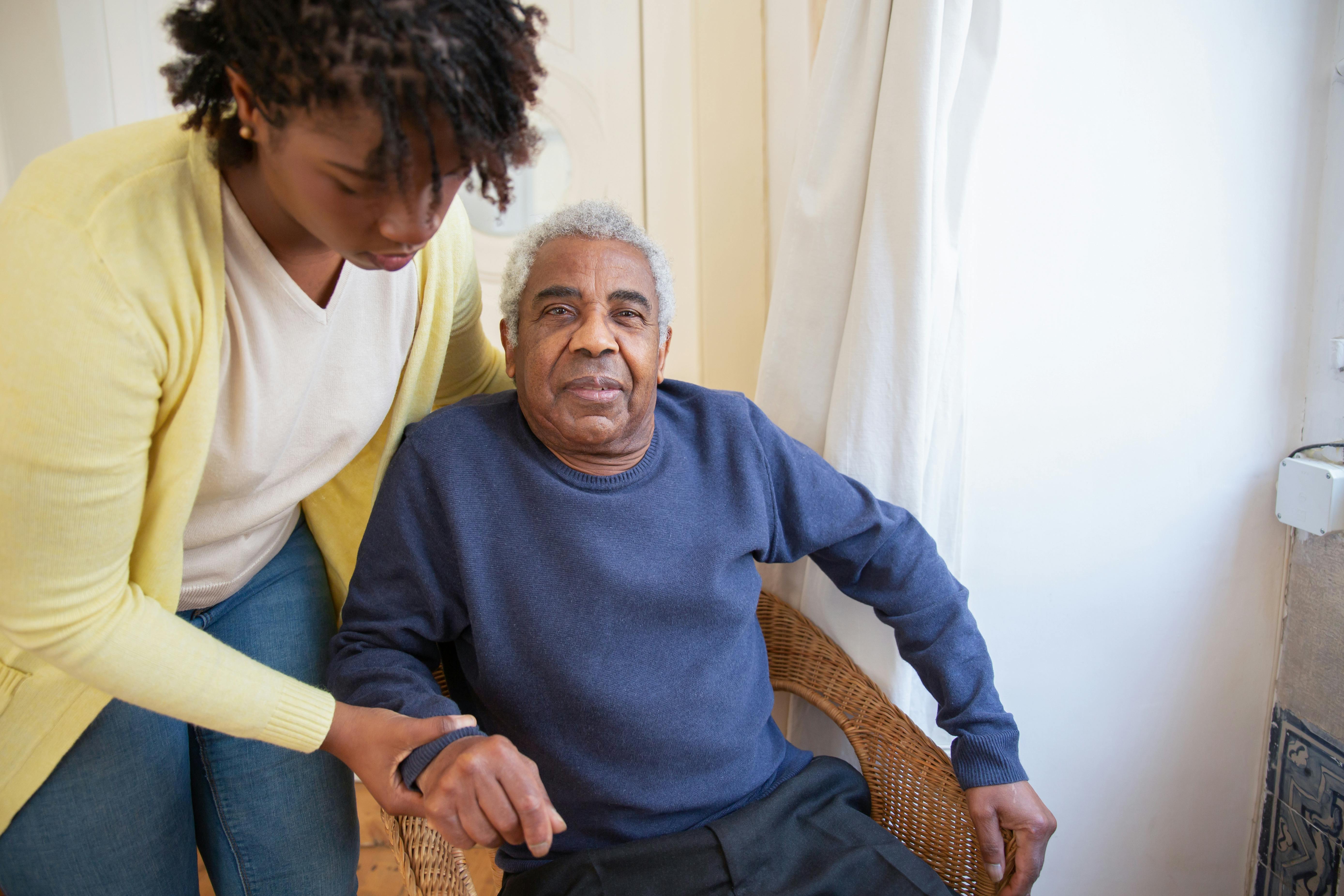 Assisted living caregiver with senior
